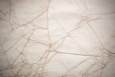 Eski kağıt çarşaf. Toz ve kirli lekelerle dolu boş bir arka plan. Eski ve antika sanat konsepti. Ayrıntılı yakın çekim stüdyo çekimi. Ön manzara. Ayarlanmış