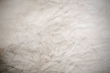 Eski kağıt çarşaf. Toz ve kirli lekelerle dolu boş bir arka plan. Eski ve antika sanat konsepti. Ayrıntılı yakın çekim stüdyo çekimi. Ön manzara. Ayarlanmış