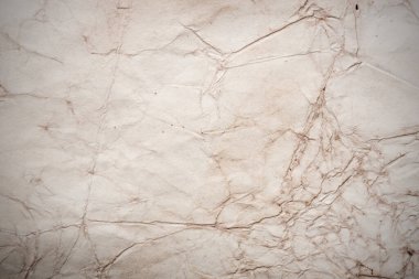 Eski kağıt çarşaf. Toz ve kirli lekelerle dolu boş bir arka plan. Eski ve antika sanat konsepti. Ayrıntılı yakın çekim stüdyo çekimi. Ön manzara. Ayarlanmış