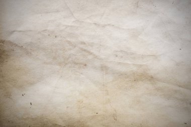 Eski kağıt çarşaf. Toz ve kirli lekelerle dolu boş bir arka plan. Eski ve antika sanat konsepti. Ayrıntılı yakın çekim stüdyo çekimi. Ön manzara. Ayarlanmış