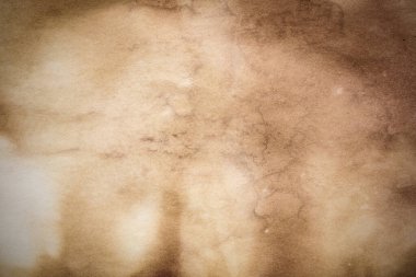 Eski kağıt çarşaf. Toz ve kirli lekelerle dolu boş bir arka plan. Eski ve antika sanat konsepti. Ayrıntılı yakın çekim stüdyo çekimi. Ön manzara. Ayarlanmış