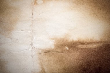 Eski kağıt çarşaf. Toz ve kirli lekelerle dolu boş bir arka plan. Eski ve antika sanat konsepti. Ayrıntılı yakın çekim stüdyo çekimi. Ön manzara. Ayarlanmış