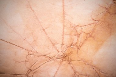 Eski kağıt çarşaf. Toz ve kirli lekelerle dolu boş bir arka plan. Eski ve antika sanat konsepti. Ayrıntılı yakın çekim stüdyo çekimi. Ön manzara. Ayarlanmış