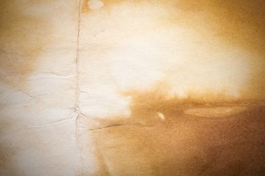 Eski kağıt çarşaf. Toz ve kirli lekelerle dolu boş bir arka plan. Eski ve antika sanat konsepti. Ayrıntılı yakın çekim stüdyo çekimi. Ön manzara. Ayarlanmış