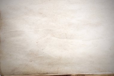 Eski kağıt çarşaf. Toz ve kirli lekelerle dolu boş bir arka plan. Eski ve antika sanat konsepti. Ayrıntılı yakın çekim stüdyo çekimi. Ön manzara. Ayarlanmış