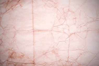 Eski kağıt çarşaf. Toz ve kirli lekelerle dolu boş bir arka plan. Eski ve antika sanat konsepti. Ayrıntılı yakın çekim stüdyo çekimi. Ön manzara. Ayarlanmış