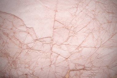 Eski kağıt çarşaf. Toz ve kirli lekelerle dolu boş bir arka plan. Eski ve antika sanat konsepti. Ayrıntılı yakın çekim stüdyo çekimi. Ön manzara. Ayarlanmış