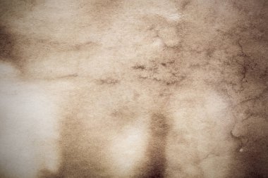 Eski kağıt çarşaf. Toz ve kirli lekelerle dolu boş bir arka plan. Eski ve antika sanat konsepti. Ayrıntılı yakın çekim stüdyo çekimi. Ön manzara. Ayarlanmış
