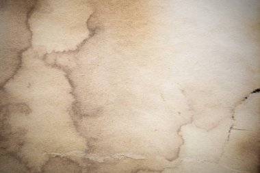 Eski kağıt çarşaf. Toz ve kirli lekelerle dolu boş bir arka plan. Eski ve antika sanat konsepti. Ayrıntılı yakın çekim stüdyo çekimi. Ön manzara. Ayarlanmış