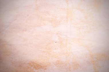 Eski kağıt çarşaf. Toz ve kirli lekelerle dolu boş bir arka plan. Eski ve antika sanat konsepti. Ayrıntılı yakın çekim stüdyo çekimi. Ön manzara. Ayarlanmış