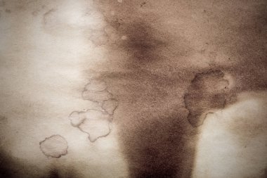 Eski kağıt çarşaf. Toz ve kirli lekelerle dolu boş bir arka plan. Eski ve antika sanat konsepti. Ayrıntılı yakın çekim stüdyo çekimi. Ön manzara. Ayarlanmış