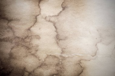 Eski kağıt çarşaf. Toz ve kirli lekelerle dolu boş bir arka plan. Eski ve antika sanat konsepti. Ayrıntılı yakın çekim stüdyo çekimi. Ön manzara. Ayarlanmış