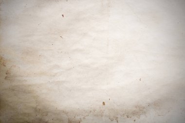 Eski kağıt çarşaf. Toz ve kirli lekelerle dolu boş bir arka plan. Eski ve antika sanat konsepti. Ayrıntılı yakın çekim stüdyo çekimi. Ön manzara. Ayarlanmış