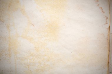 Eski kağıt çarşaf. Toz ve kirli lekelerle dolu boş bir arka plan. Eski ve antika sanat konsepti. Ayrıntılı yakın çekim stüdyo çekimi. Ön manzara. Ayarlanmış