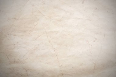 Eski kağıt çarşaf. Toz ve kirli lekelerle dolu boş bir arka plan. Eski ve antika sanat konsepti. Ayrıntılı yakın çekim stüdyo çekimi. Ön manzara. Ayarlanmış