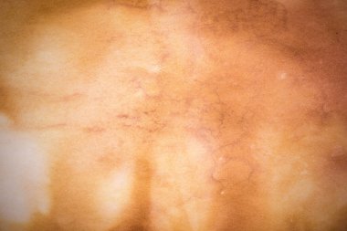 Eski kağıt çarşaf. Toz ve kirli lekelerle dolu boş bir arka plan. Eski ve antika sanat konsepti. Ayrıntılı yakın çekim stüdyo çekimi. Ön manzara. Ayarlanmış