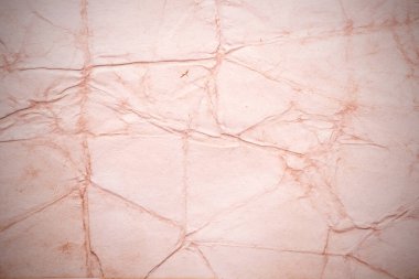 Eski kağıt çarşaf. Toz ve kirli lekelerle dolu boş bir arka plan. Eski ve antika sanat konsepti. Ayrıntılı yakın çekim stüdyo çekimi. Ön manzara. Ayarlanmış