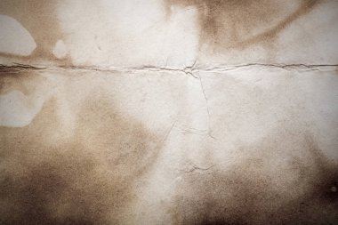Eski kağıt çarşaf. Toz ve kirli lekelerle dolu boş bir arka plan. Eski ve antika sanat konsepti. Ayrıntılı yakın çekim stüdyo çekimi. Ön manzara. Ayarlanmış