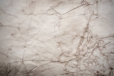 Eski kağıt çarşaf. Toz ve kirli lekelerle dolu boş bir arka plan. Eski ve antika sanat konsepti. Ayrıntılı yakın çekim stüdyo çekimi. Ön manzara. Ayarlanmış