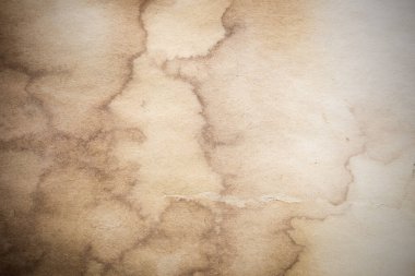 Eski kağıt çarşaf. Toz ve kirli lekelerle dolu boş bir arka plan. Eski ve antika sanat konsepti. Ayrıntılı yakın çekim stüdyo çekimi. Ön manzara. Ayarlanmış