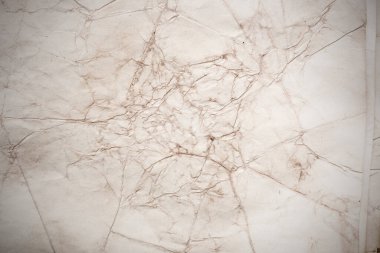 Eski kağıt çarşaf. Toz ve kirli lekelerle dolu boş bir arka plan. Eski ve antika sanat konsepti. Ayrıntılı yakın çekim stüdyo çekimi. Ön manzara. Ayarlanmış