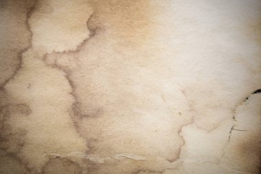 Eski kağıt çarşaf. Toz ve kirli lekelerle dolu boş bir arka plan. Eski ve antika sanat konsepti. Ayrıntılı yakın çekim stüdyo çekimi. Ön manzara. Ayarlanmış