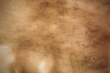 Eski kağıt çarşaf. Toz ve kirli lekelerle dolu boş bir arka plan. Eski ve antika sanat konsepti. Ayrıntılı yakın çekim stüdyo çekimi. Ön manzara. Ayarlanmış