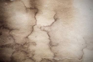 Eski kağıt çarşaf. Toz ve kirli lekelerle dolu boş bir arka plan. Eski ve antika sanat konsepti. Ayrıntılı yakın çekim stüdyo çekimi. Ön manzara. Ayarlanmış