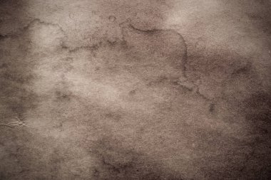 Eski kağıt çarşaf. Toz ve kirli lekelerle dolu boş bir arka plan. Eski ve antika sanat konsepti. Ayrıntılı yakın çekim stüdyo çekimi. Ön manzara. Ayarlanmış