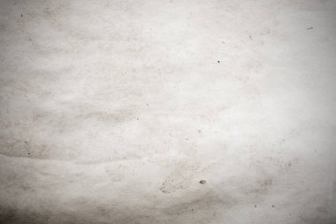 Eski kağıt çarşaf. Toz ve kirli lekelerle dolu boş bir arka plan. Eski ve antika sanat konsepti. Ayrıntılı yakın çekim stüdyo çekimi. Ön manzara. Ayarlanmış