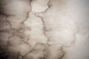 Eski kağıt çarşaf. Toz ve kirli lekelerle dolu boş bir arka plan. Eski ve antika sanat konsepti. Ayrıntılı yakın çekim stüdyo çekimi. Ön manzara. Ayarlanmış