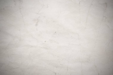 Eski kağıt çarşaf. Toz ve kirli lekelerle dolu boş bir arka plan. Eski ve antika sanat konsepti. Ayrıntılı yakın çekim stüdyo çekimi. Ön manzara. Ayarlanmış