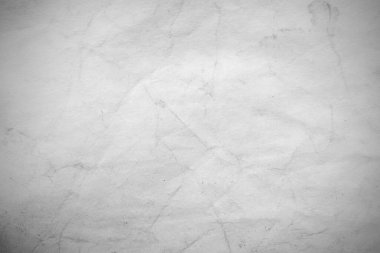 Eski kağıt çarşaf. Toz ve kirli lekelerle dolu boş bir arka plan. Eski ve antika sanat konsepti. Ayrıntılı yakın çekim stüdyo çekimi. Ön manzara. Ayarlanmış