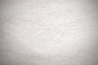 Eski kağıt çarşaf. Toz ve kirli lekelerle dolu boş bir arka plan. Eski ve antika sanat konsepti. Ayrıntılı yakın çekim stüdyo çekimi. Ön manzara. Ayarlanmış