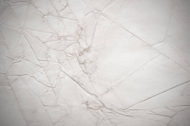 Eski kağıt çarşaf. Toz ve kirli lekelerle dolu boş bir arka plan. Eski ve antika sanat konsepti. Ayrıntılı yakın çekim stüdyo çekimi. Ön manzara. Ayarlanmış