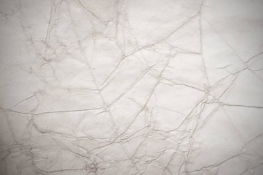 Eski kağıt çarşaf. Toz ve kirli lekelerle dolu boş bir arka plan. Eski ve antika sanat konsepti. Ayrıntılı yakın çekim stüdyo çekimi. Ön manzara. Ayarlanmış