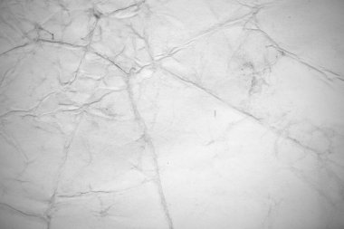 Eski kağıt çarşaf. Toz ve kirli lekelerle dolu boş bir arka plan. Eski ve antika sanat konsepti. Ayrıntılı yakın çekim stüdyo çekimi. Ön manzara. Ayarlanmış