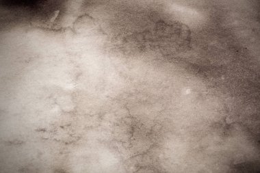 Eski kağıt çarşaf. Toz ve kirli lekelerle dolu boş bir arka plan. Eski ve antika sanat konsepti. Ayrıntılı yakın çekim stüdyo çekimi. Ön manzara. Ayarlanmış