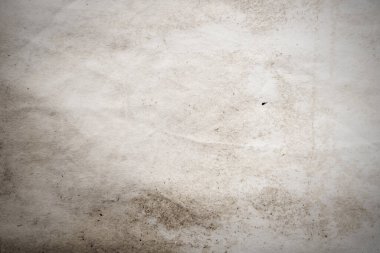 Eski kağıt çarşaf. Toz ve kirli lekelerle dolu boş bir arka plan. Eski ve antika sanat konsepti. Ayrıntılı yakın çekim stüdyo çekimi. Ön manzara. Ayarlanmış