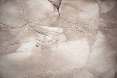 Eski kağıt çarşaf. Toz ve kirli lekelerle dolu boş bir arka plan. Eski ve antika sanat konsepti. Ayrıntılı yakın çekim stüdyo çekimi. Ön manzara. Ayarlanmış