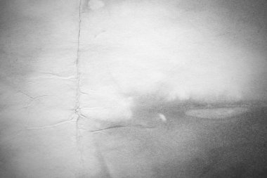 Eski kağıt çarşaf. Toz ve kirli lekelerle dolu boş bir arka plan. Eski ve antika sanat konsepti. Ayrıntılı yakın çekim stüdyo çekimi. Ön manzara. Ayarlanmış