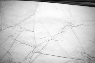 Eski kağıt çarşaf. Toz ve kirli lekelerle dolu boş bir arka plan. Eski ve antika sanat konsepti. Ayrıntılı yakın çekim stüdyo çekimi. Ön manzara. Ayarlanmış