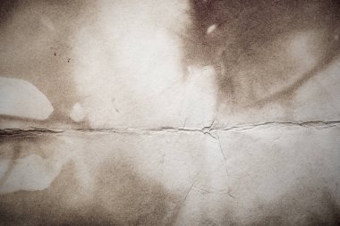 Eski kağıt çarşaf. Toz ve kirli lekelerle dolu boş bir arka plan. Eski ve antika sanat konsepti. Ayrıntılı yakın çekim stüdyo çekimi. Ön manzara. Ayarlanmış