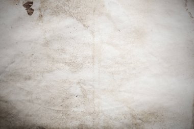 Eski kağıt çarşaf. Toz ve kirli lekelerle dolu boş bir arka plan. Eski ve antika sanat konsepti. Ayrıntılı yakın çekim stüdyo çekimi. Ön manzara. Ayarlanmış