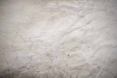 Eski kağıt çarşaf. Toz ve kirli lekelerle dolu boş bir arka plan. Eski ve antika sanat konsepti. Ayrıntılı yakın çekim stüdyo çekimi. Ön manzara. Ayarlanmış