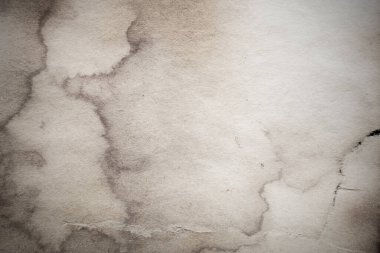 Eski kağıt çarşaf. Toz ve kirli lekelerle dolu boş bir arka plan. Eski ve antika sanat konsepti. Ayrıntılı yakın çekim stüdyo çekimi. Ön manzara. Ayarlanmış