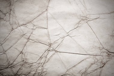 Eski kağıt çarşaf. Toz ve kirli lekelerle dolu boş bir arka plan. Eski ve antika sanat konsepti. Ayrıntılı yakın çekim stüdyo çekimi. Ön manzara. Ayarlanmış