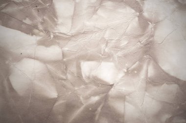 Eski kağıt çarşaf. Toz ve kirli lekelerle dolu boş bir arka plan. Eski ve antika sanat konsepti. Ayrıntılı yakın çekim stüdyo çekimi. Ön manzara. Ayarlanmış