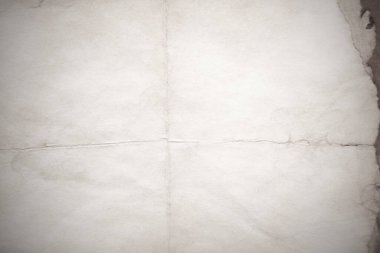 Eski kağıt çarşaf. Toz ve kirli lekelerle dolu boş bir arka plan. Eski ve antika sanat konsepti. Ayrıntılı yakın çekim stüdyo çekimi. Ön manzara. Ayarlanmış