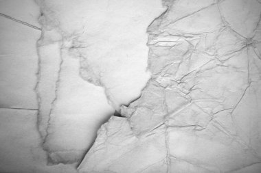 Eski kağıt çarşaf. Toz ve kirli lekelerle dolu boş bir arka plan. Eski ve antika sanat konsepti. Ayrıntılı yakın çekim stüdyo çekimi. Ön manzara. Ayarlanmış